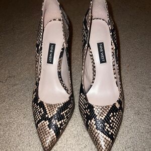Snake skin nine wear heels